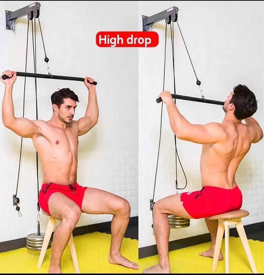 Wall pulley with base for multiple exercises