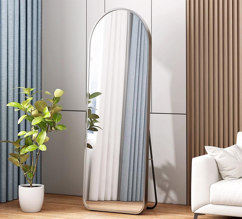 Arc shaped tall mirror for home decor.