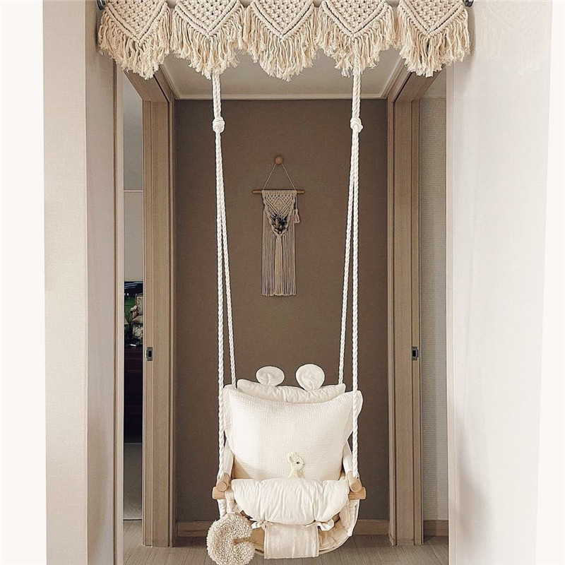 A swing for children in indoor and outdoor places with a safety belt, a cloth swing