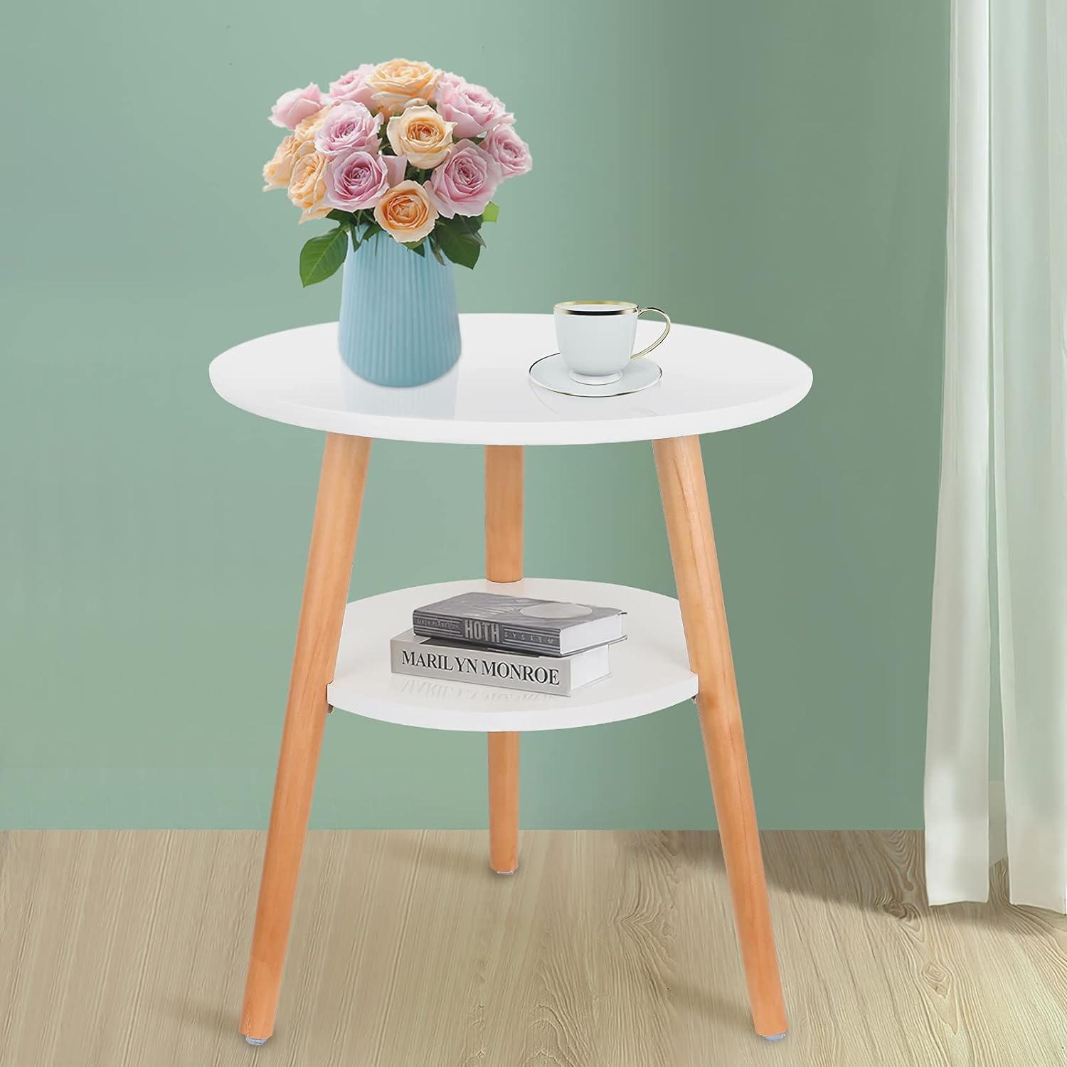 Small white round side table with three wooden legs for living room