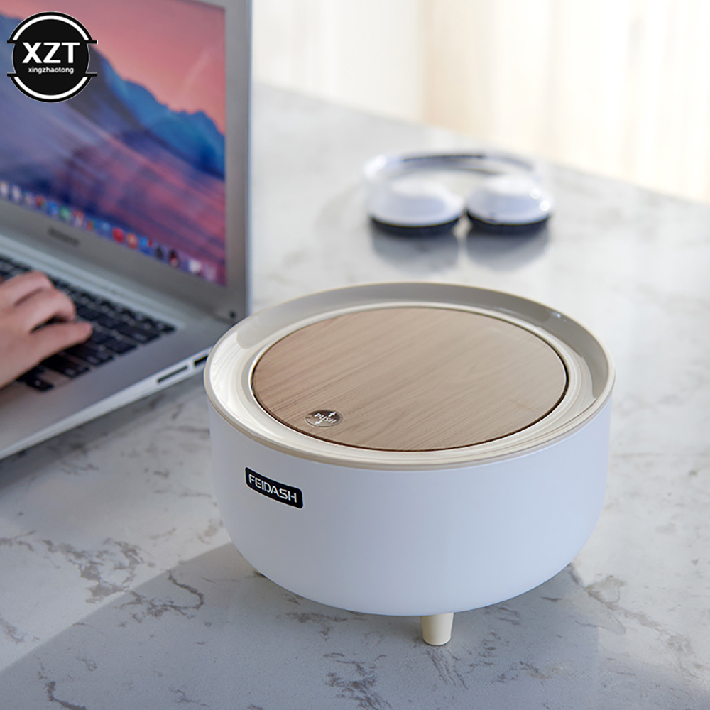 Small desktop trash can is simple in round shape