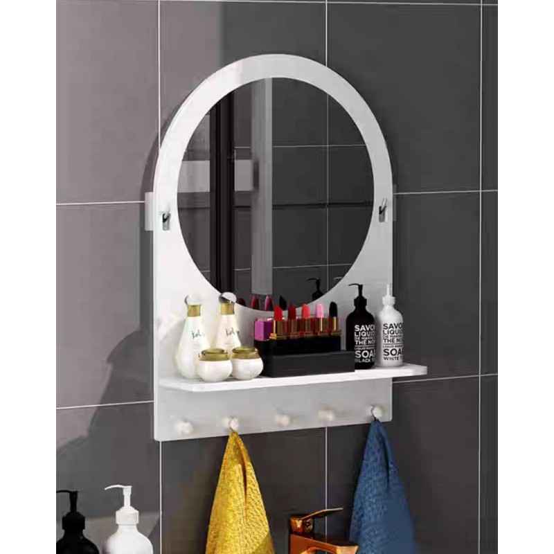 Circular bathroom mirror with shelf and hangers for bathrobes