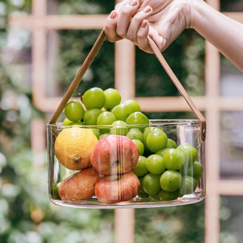 Transparent fruit basket with distinctive leather handle