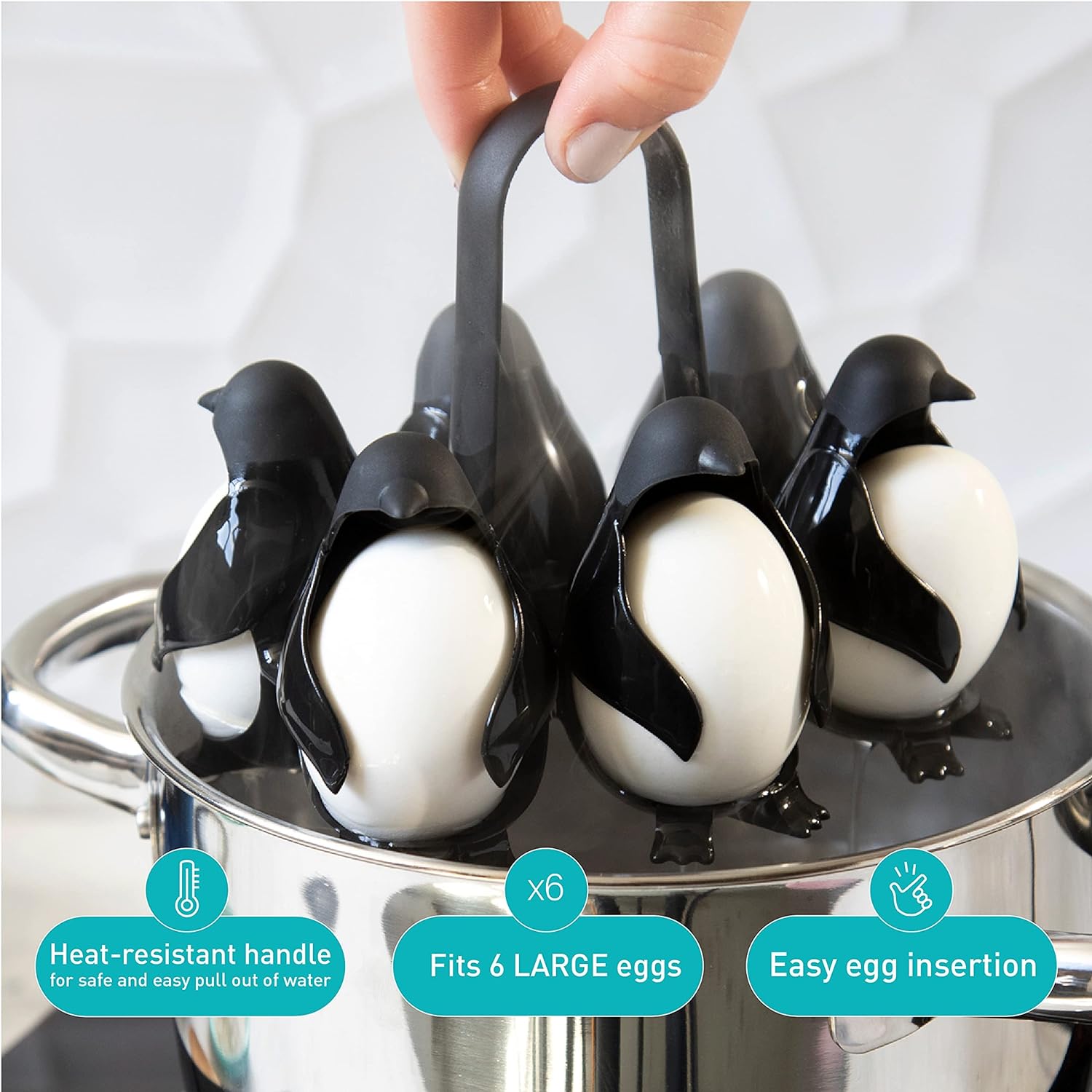 Penguin-shaped egg boiler for hard or soft eggs, holds 6 eggs