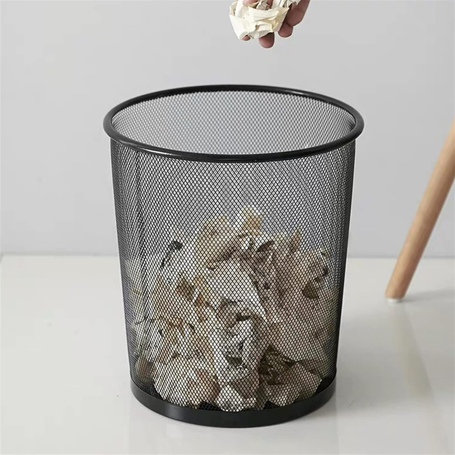 Black stainless steel mesh trash can