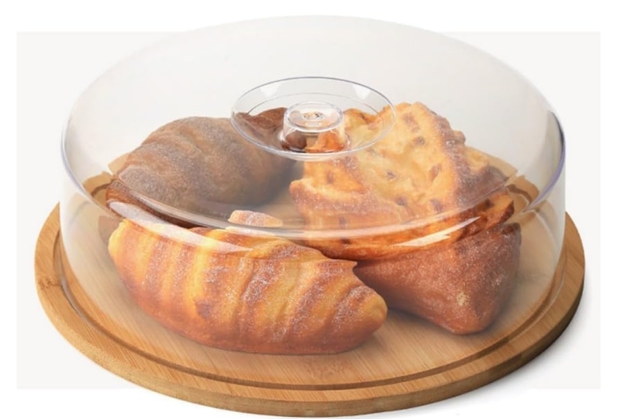 A wooden Bowl with an Acrylic Lid for Storing Cakes and Sweets