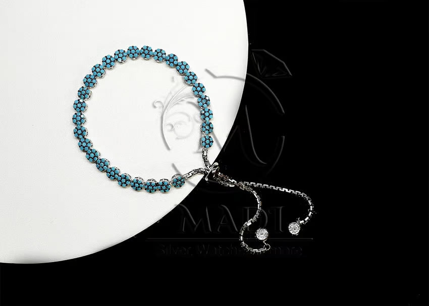 Silver Bracelet Studded with Blue Stones
